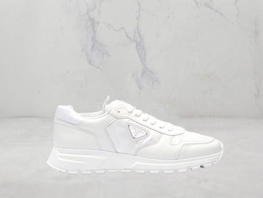 Prada Baskets Montantes Cuir et Nylon - Blanc
